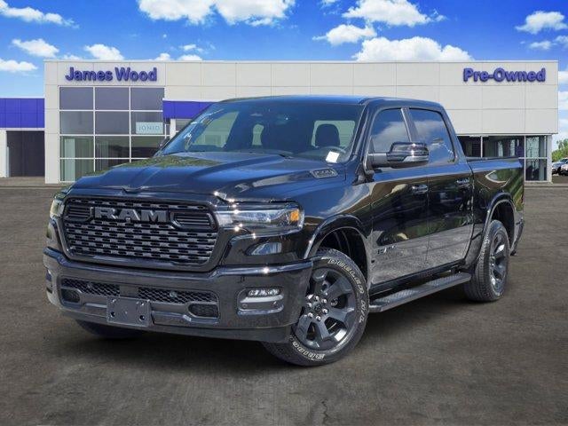 2026 RAM 1500 Lone Star Crew Cab 4x4 5'7" Box in Black — front three-quarter view