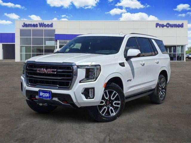 2024 GMC Yukon AT4 in White Frost Tricoat — front three-quarter view