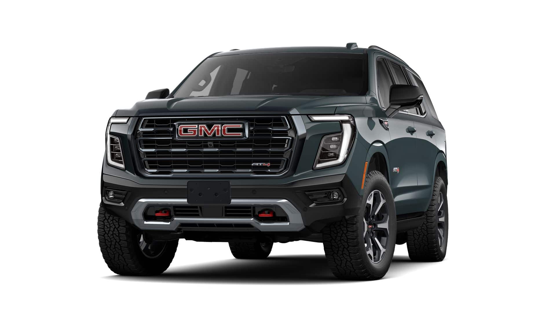 2026 GMC Yukon AT4 in Midnight Pine — front three-quarter view