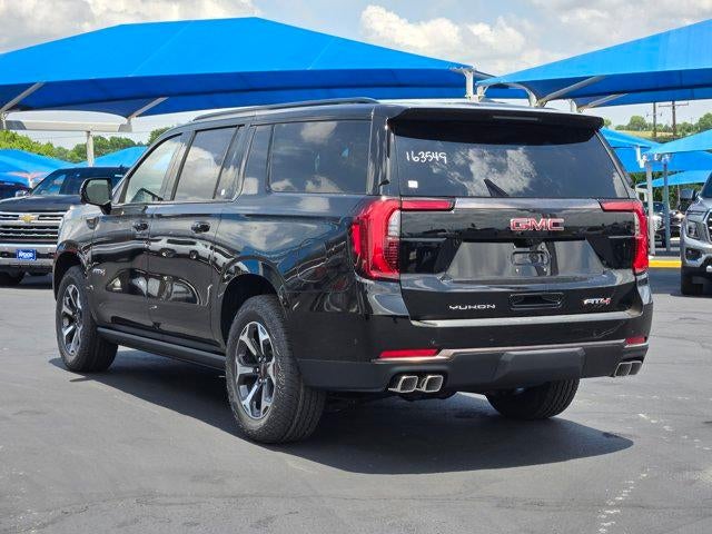2026 GMC Yukon XL — rear three-quarter view