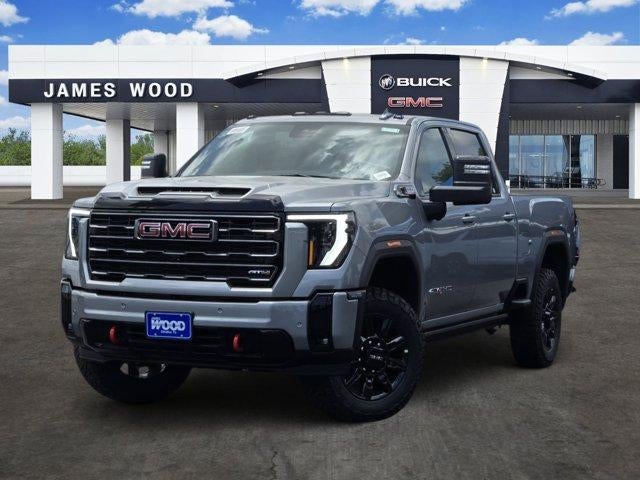 2026 GMC Sierra 2500 HD AT4 in Sterling Metallic — front three-quarter view