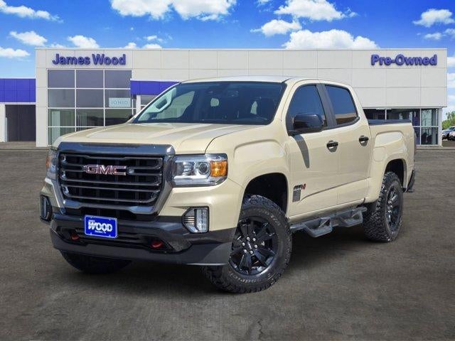 2021 GMC Canyon 4WD AT4 w/Cloth in Desert Sand Metallic — front three-quarter view