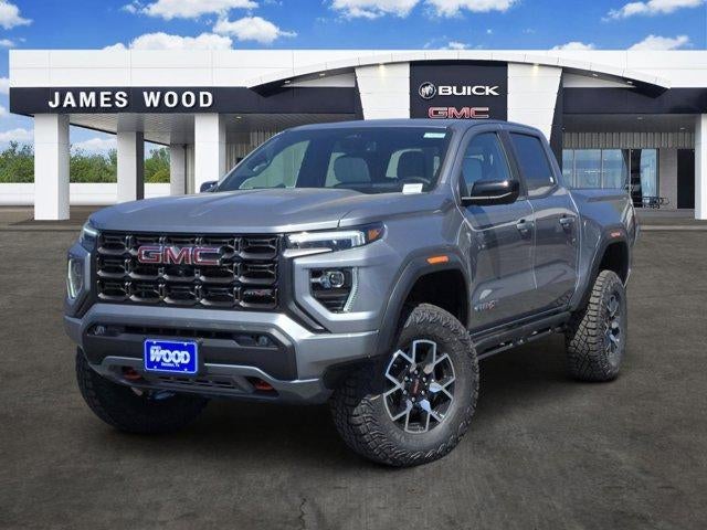 2026 GMC Canyon AT4X in Sterling Metallic — front three-quarter view