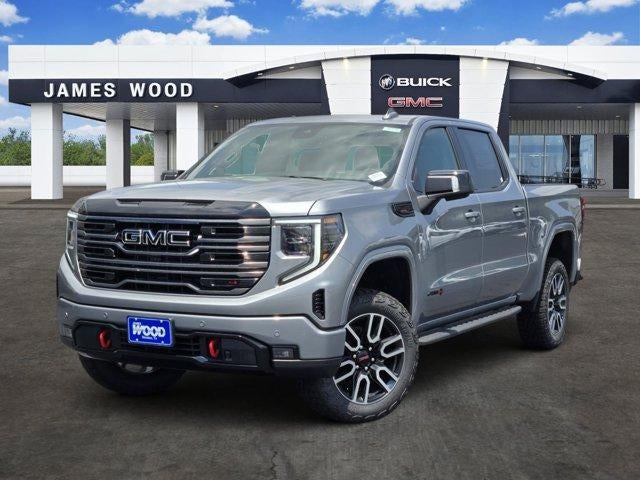 2026 GMC Sierra 1500 AT4 in Sterling Metallic — front three-quarter view