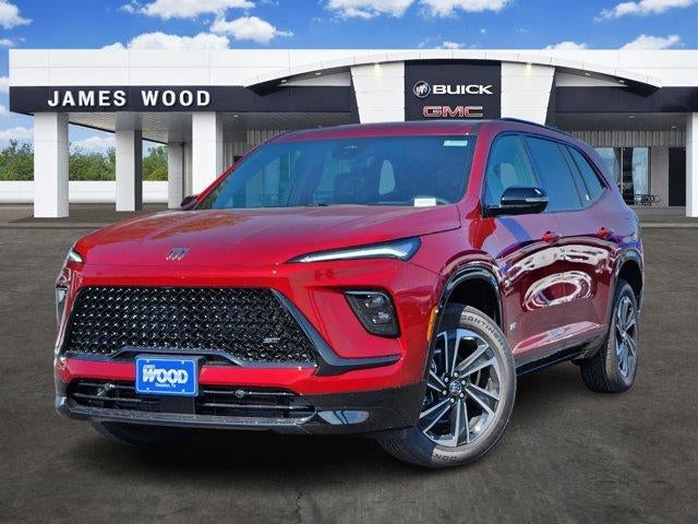 2026 Buick Enclave Sport Touring in Cherry Red Tintcoat — front three-quarter view