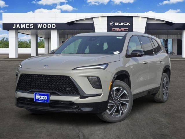 2026 Buick Enclave Sport Touring in Stone Metallic — front three-quarter view