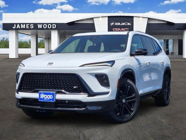 2026 Buick Enclave Sport Touring in Summit White — front three-quarter view