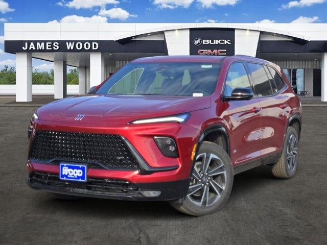 2026 Buick Enclave Sport Touring in Cherry Red Tintcoat — front three-quarter view